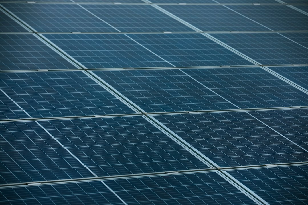 Photo peer-to-peer renewable energy trading microgrid