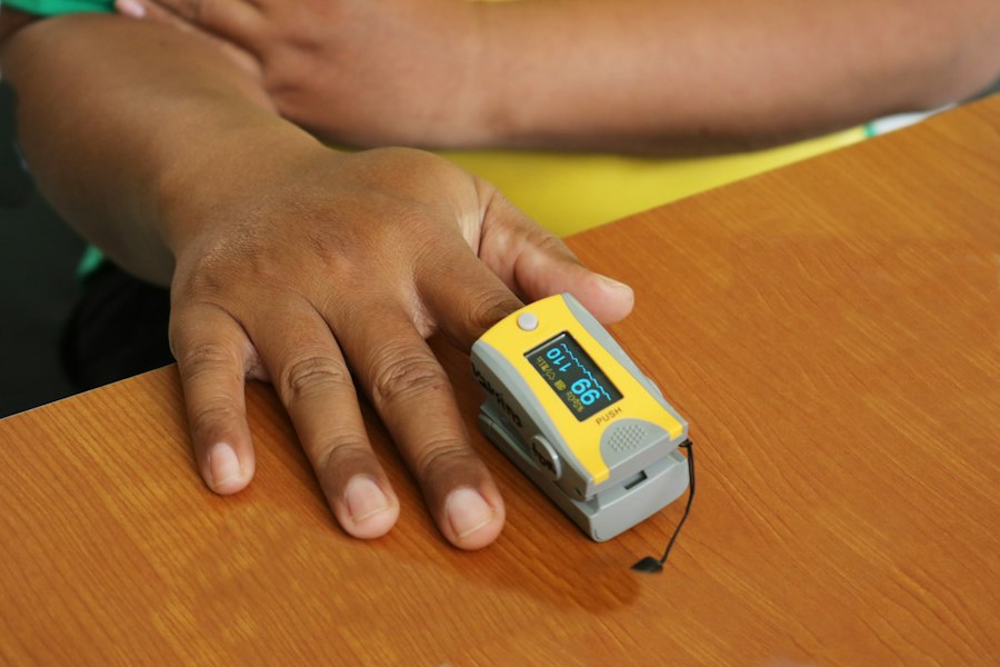 Photo Pulse oximetry calibration dark skin tones wearable tech